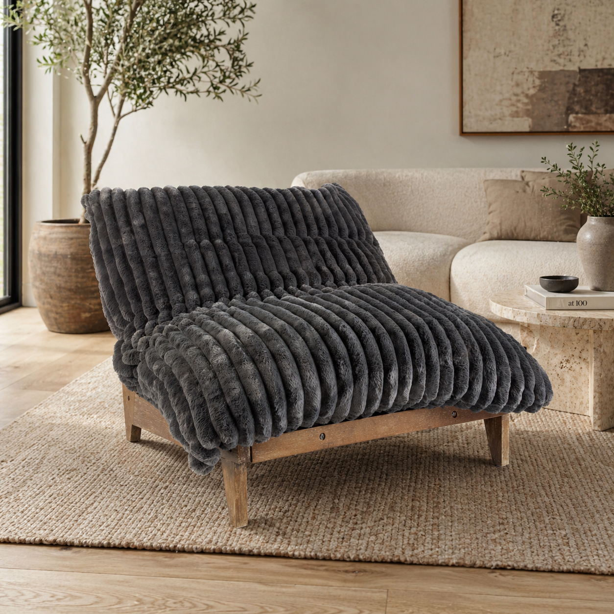 Montclair plush ribbed lounge chair with acacia wood frame, oversized cushion, low-profile armless design